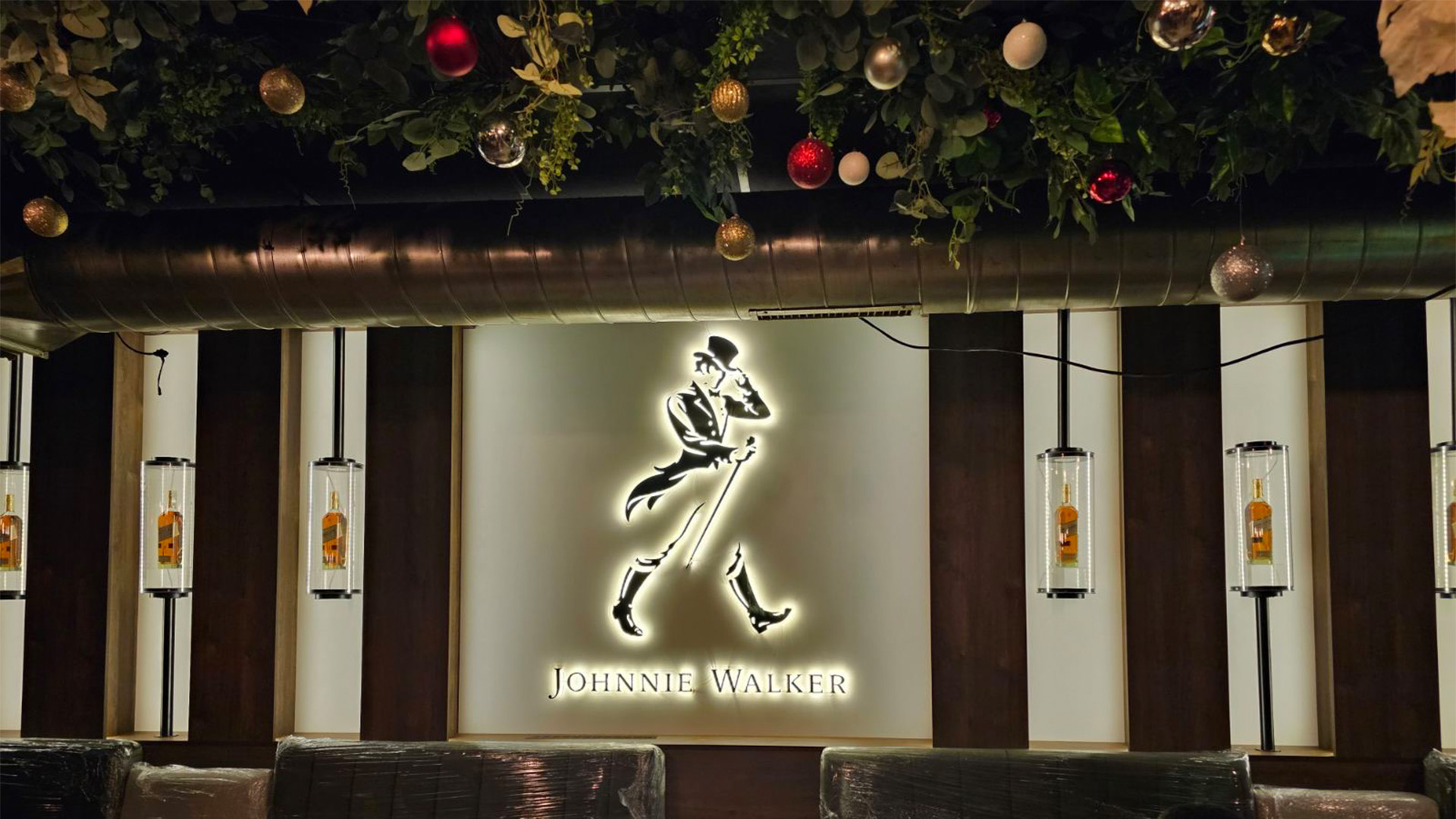 Advertising signage for Johnny Walker by J-point